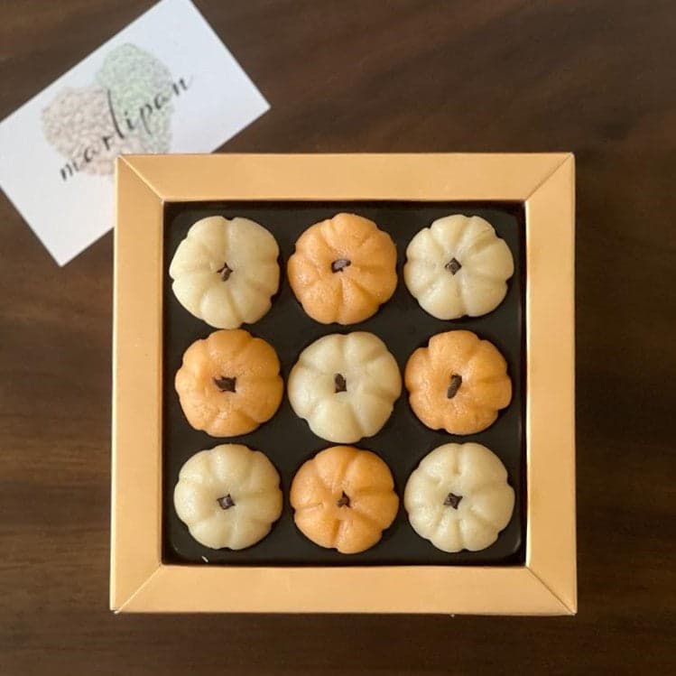 Handcrafted marzipan pumpkins in a gift box