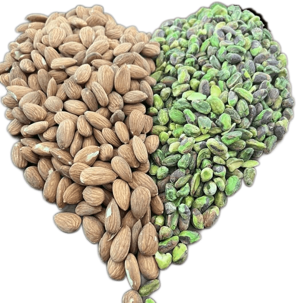 Raw almonds and pistachios arranged in the shape of a heart